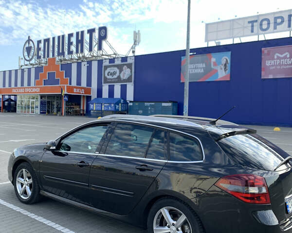 Черный Рено Лагуна, объемом двигателя 2.02 л и пробегом 305 тыс. км за 8500 $, фото 1 на Automoto.ua