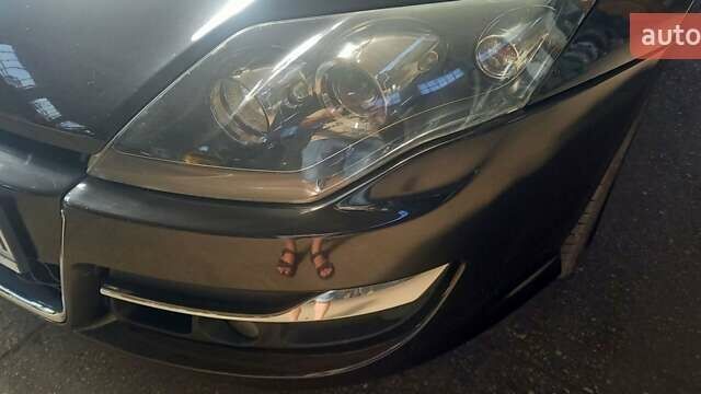 Черный Рено Лагуна, объемом двигателя 1.46 л и пробегом 200 тыс. км за 8000 $, фото 1 на Automoto.ua