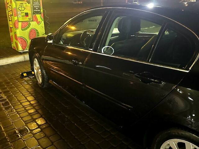 Черный Рено Лагуна, объемом двигателя 2 л и пробегом 235 тыс. км за 6500 $, фото 1 на Automoto.ua