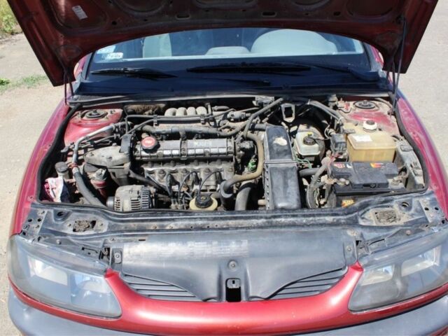 Червоний Рено Лагуна, об'ємом двигуна 2 л та пробігом 153 тис. км за 1800 $, фото 1 на Automoto.ua