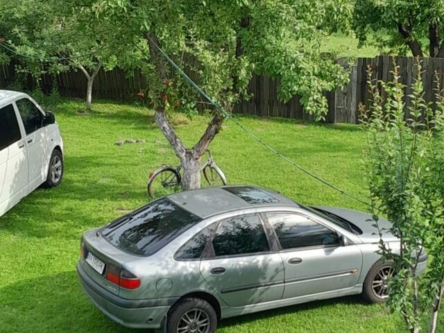 Сірий Рено Лагуна, об'ємом двигуна 2 л та пробігом 245 тис. км за 3150 $, фото 1 на Automoto.ua