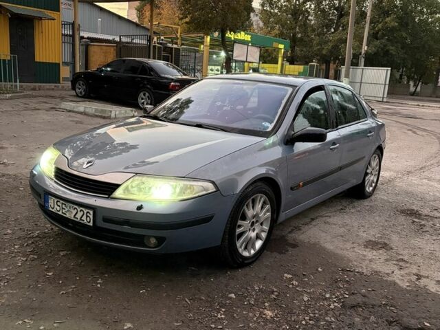 Серый Рено Лагуна, объемом двигателя 2 л и пробегом 242 тыс. км за 854 $, фото 1 на Automoto.ua