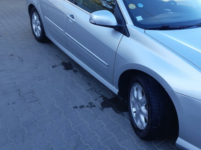 Сірий Рено Лагуна, об'ємом двигуна 1.5 л та пробігом 276 тис. км за 6700 $, фото 1 на Automoto.ua