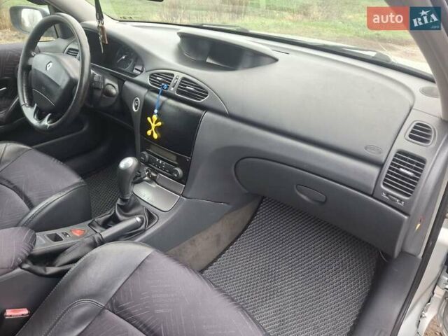 Серый Рено Лагуна, объемом двигателя 2 л и пробегом 186 тыс. км за 4200 $, фото 1 на Automoto.ua