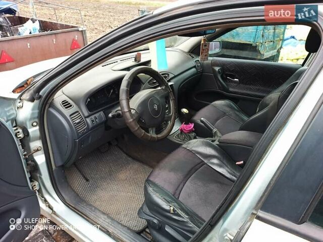 Серый Рено Лагуна, объемом двигателя 2.19 л и пробегом 430 тыс. км за 4200 $, фото 1 на Automoto.ua