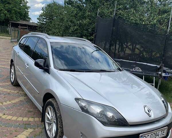 Серый Рено Лагуна, объемом двигателя 2 л и пробегом 306 тыс. км за 6000 $, фото 1 на Automoto.ua