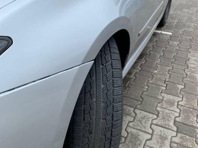 Сірий Рено Лагуна, об'ємом двигуна 2 л та пробігом 335 тис. км за 7600 $, фото 1 на Automoto.ua