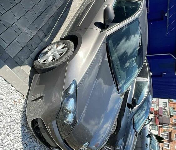 Серый Рено Лагуна, объемом двигателя 1.5 л и пробегом 232 тыс. км за 6400 $, фото 1 на Automoto.ua