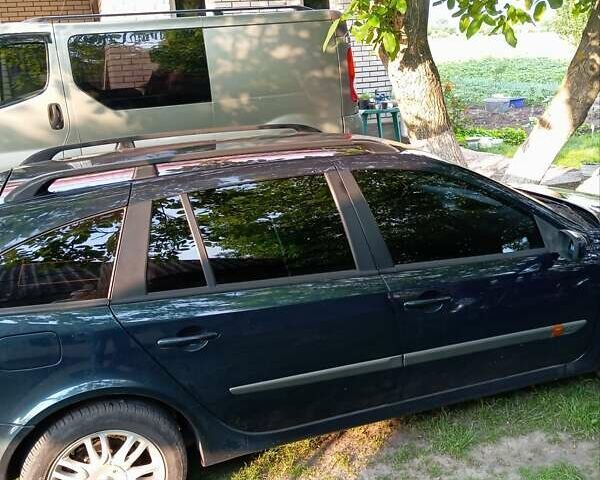 Синий Рено Лагуна, объемом двигателя 1.9 л и пробегом 245 тыс. км за 3400 $, фото 1 на Automoto.ua