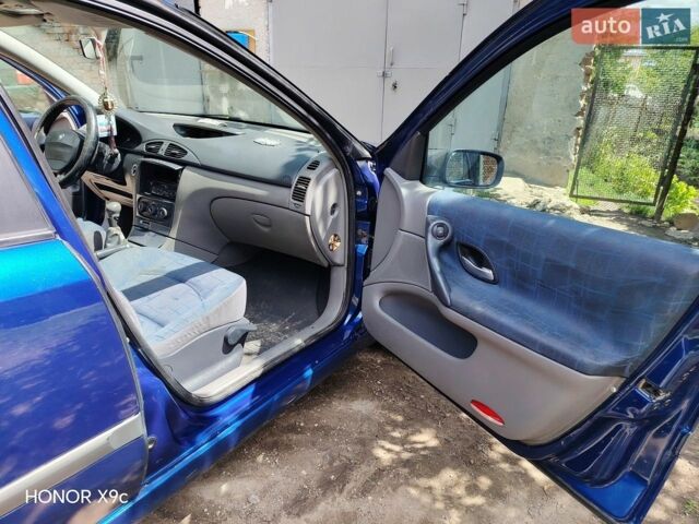 Синий Рено Лагуна, объемом двигателя 1.6 л и пробегом 238 тыс. км за 2200 $, фото 1 на Automoto.ua