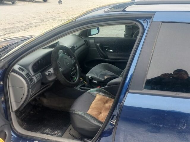 Синій Рено Лагуна, об'ємом двигуна 1 л та пробігом 425 тис. км за 3100 $, фото 1 на Automoto.ua