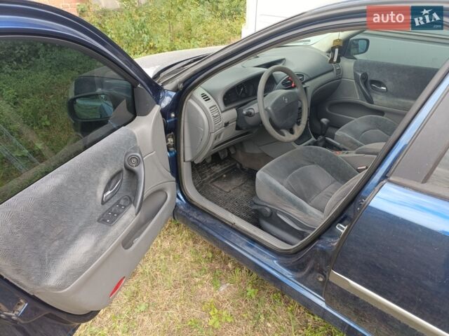 Синій Рено Лагуна, об'ємом двигуна 2 л та пробігом 300 тис. км за 3100 $, фото 1 на Automoto.ua