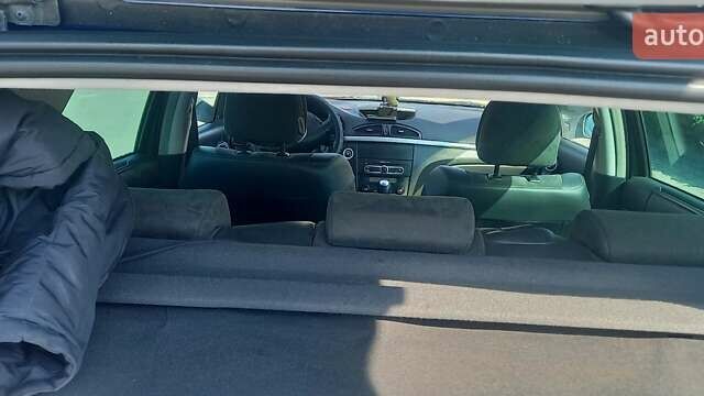 Синий Рено Лагуна, объемом двигателя 2 л и пробегом 212 тыс. км за 5000 $, фото 1 на Automoto.ua