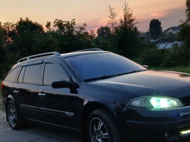 Синій Рено Лагуна, об'ємом двигуна 2 л та пробігом 261 тис. км за 4000 $, фото 1 на Automoto.ua