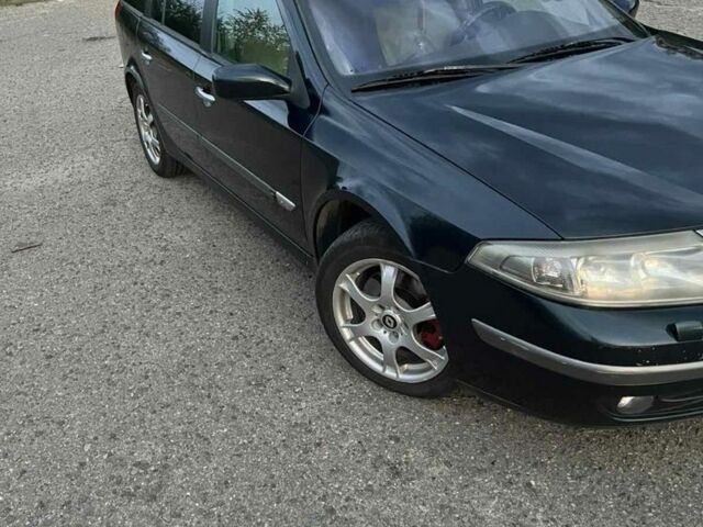 Зеленый Рено Лагуна, объемом двигателя 1.9 л и пробегом 293 тыс. км за 4100 $, фото 1 на Automoto.ua