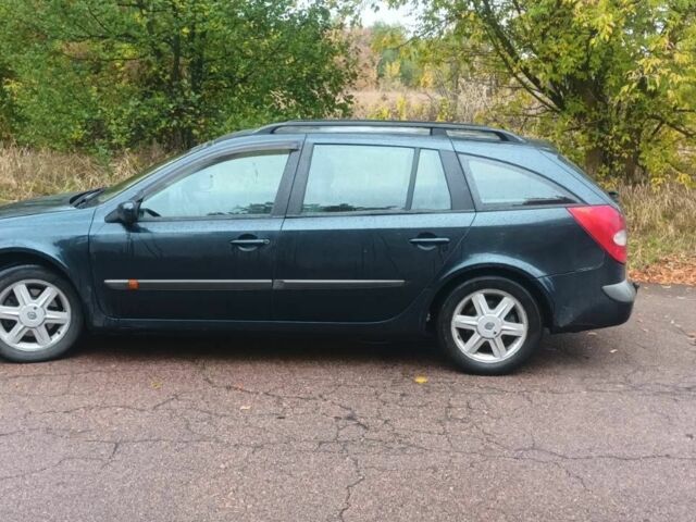 Зеленый Рено Лагуна, объемом двигателя 2 л и пробегом 450 тыс. км за 1700 $, фото 1 на Automoto.ua