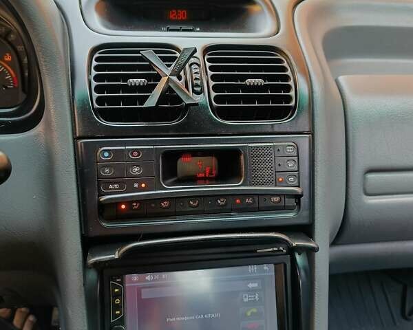 Зеленый Рено Лагуна, объемом двигателя 2 л и пробегом 325 тыс. км за 2400 $, фото 1 на Automoto.ua