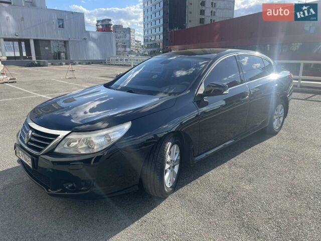 Черный Рено Латитьюд, объемом двигателя 2 л и пробегом 293 тыс. км за 5500 $, фото 1 на Automoto.ua