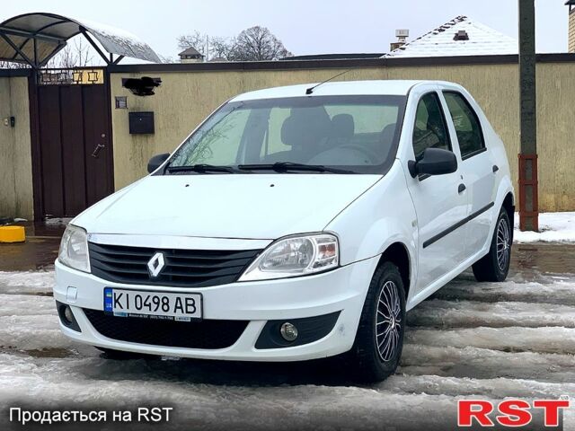 Белый Рено Логан, объемом двигателя 1.4 л и пробегом 213 тыс. км за 3899 $, фото 1 на Automoto.ua