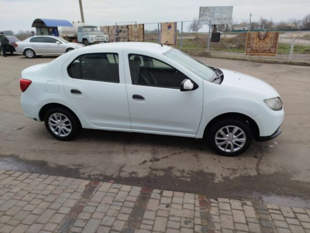 Білий Рено Логан, об'ємом двигуна 1.1 л та пробігом 200 тис. км за 3999 $, фото 1 на Automoto.ua