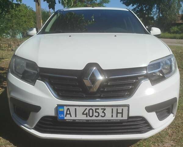 Белый Рено Логан, объемом двигателя 1 л и пробегом 175 тыс. км за 6900 $, фото 1 на Automoto.ua