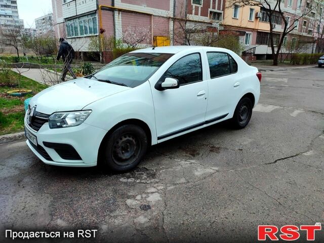 Білий Рено Логан, об'ємом двигуна 1 л та пробігом 180 тис. км за 4299 $, фото 1 на Automoto.ua