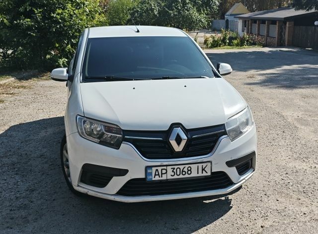 Белый Рено Логан, объемом двигателя 1 л и пробегом 258 тыс. км за 6424 $, фото 1 на Automoto.ua