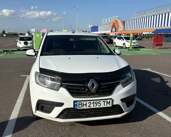 Білий Рено Логан, об'ємом двигуна 1 л та пробігом 173 тис. км за 6500 $, фото 1 на Automoto.ua