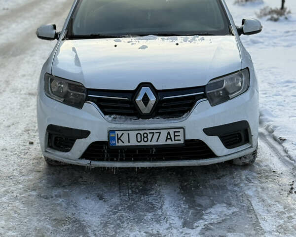 Белый Рено Логан, объемом двигателя 1 л и пробегом 290 тыс. км за 3600 $, фото 1 на Automoto.ua