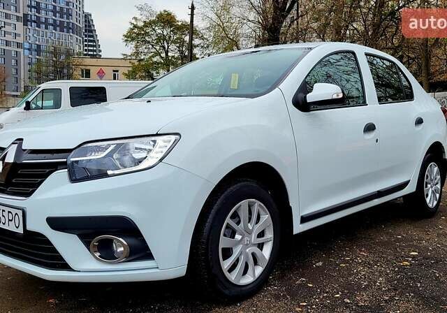 Білий Рено Логан, об'ємом двигуна 1.46 л та пробігом 80 тис. км за 8700 $, фото 1 на Automoto.ua