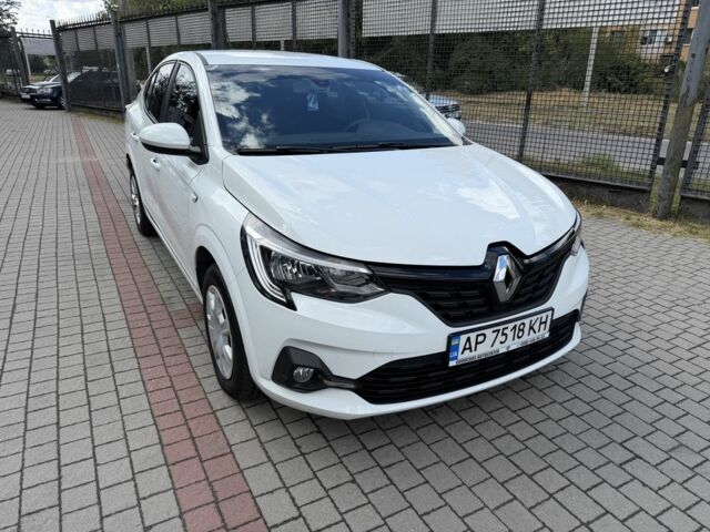 Белый Рено Логан, объемом двигателя 1 л и пробегом 22 тыс. км за 12775 $, фото 1 на Automoto.ua