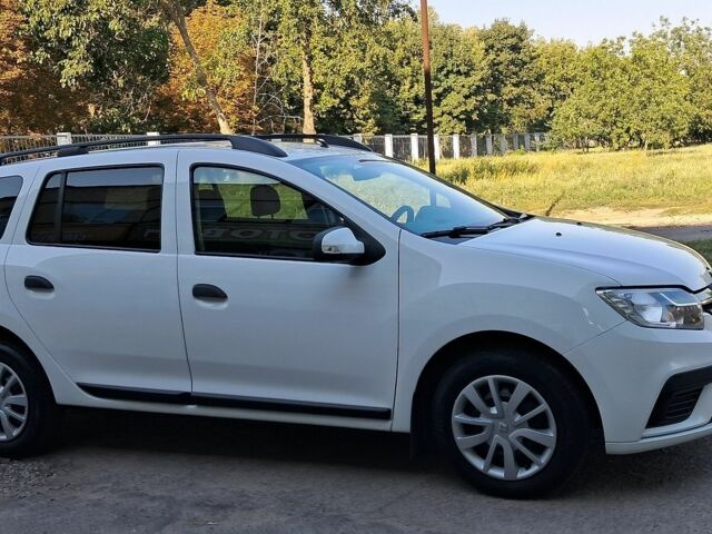 Білий Рено Логан, об'ємом двигуна 1.5 л та пробігом 64 тис. км за 9400 $, фото 1 на Automoto.ua