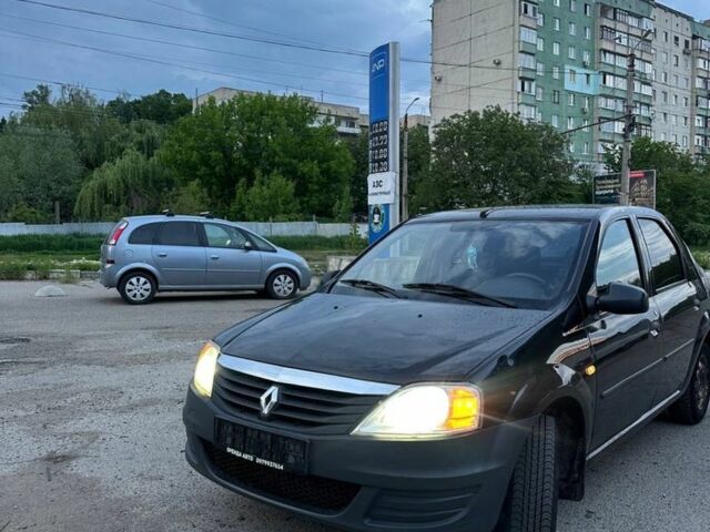 Черный Рено Логан, объемом двигателя 1.4 л и пробегом 234 тыс. км за 3800 $, фото 1 на Automoto.ua