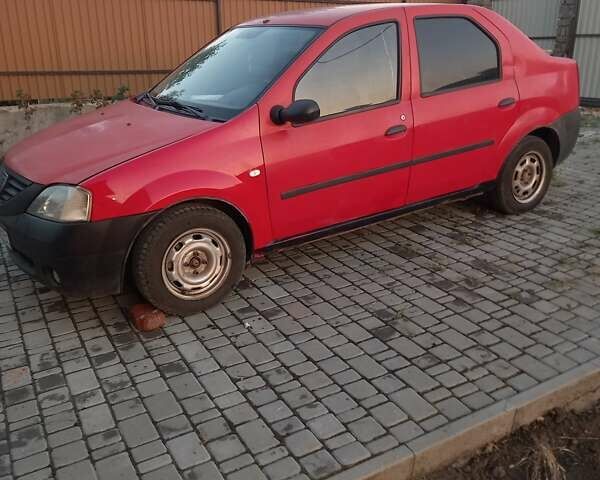 Красный Рено Логан, объемом двигателя 1.4 л и пробегом 246 тыс. км за 2450 $, фото 1 на Automoto.ua
