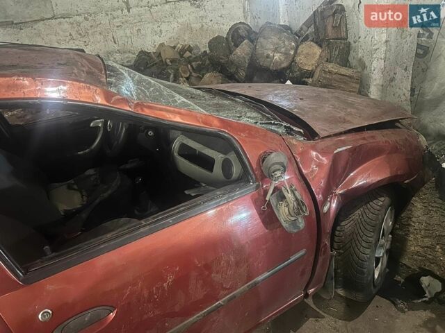 Червоний Рено Логан, об'ємом двигуна 1.4 л та пробігом 130 тис. км за 1000 $, фото 1 на Automoto.ua