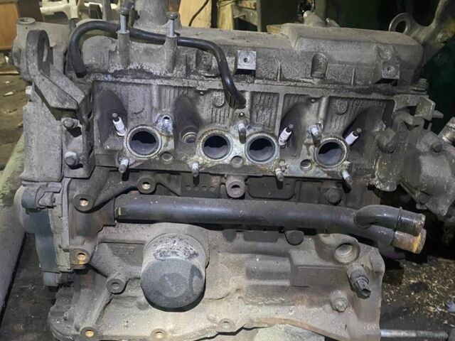 Червоний Рено Логан, об'ємом двигуна 1.6 л та пробігом 230 тис. км за 349 $, фото 1 на Automoto.ua