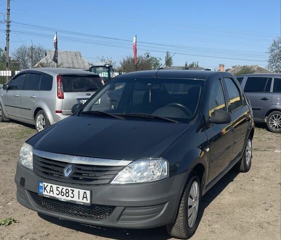 Серый Рено Логан, объемом двигателя 1.4 л и пробегом 305 тыс. км за 3900 $, фото 1 на Automoto.ua
