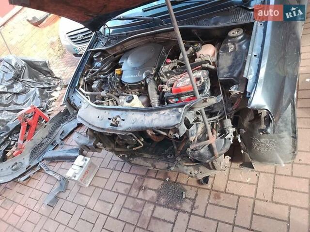 Рено Логан 2010 у Умани на Automoto.ua Сірий Рено Логан, об'ємом двигуна 1.39 л та пробігом 399 тис. км за 2000 $, фото 1 на Automoto.ua