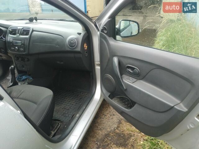 Сірий Рено Логан, об'ємом двигуна 1.19 л та пробігом 240 тис. км за 5200 $, фото 1 на Automoto.ua
