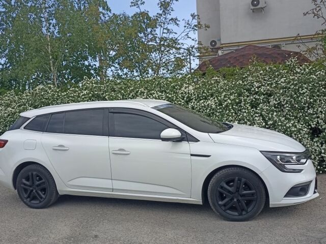 Білий Рено Меган, об'ємом двигуна 1.5 л та пробігом 230 тис. км за 11999 $, фото 1 на Automoto.ua