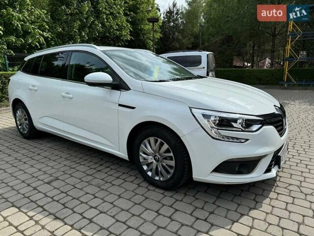 Белый Рено Меган, объемом двигателя 1.5 л и пробегом 210 тыс. км за 12000 $, фото 1 на Automoto.ua