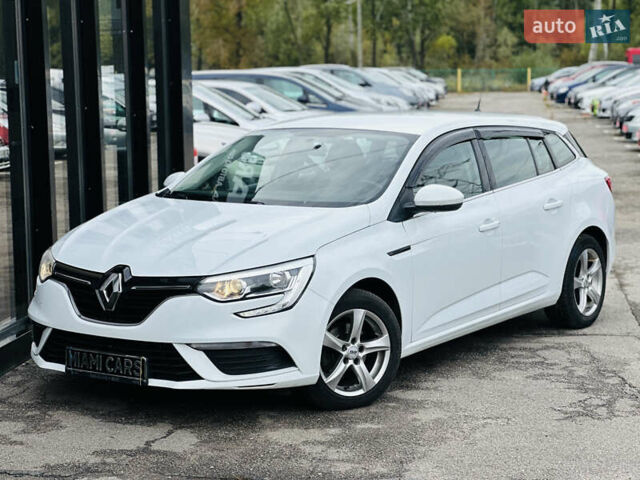 Білий Рено Меган, об'ємом двигуна 1.5 л та пробігом 191 тис. км за 11399 $, фото 1 на Automoto.ua