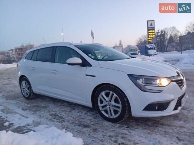 Білий Рено Меган, об'ємом двигуна 1.46 л та пробігом 200 тис. км за 11695 $, фото 1 на Automoto.ua