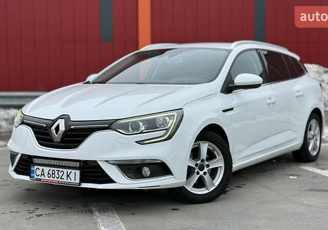 Білий Рено Меган, об'ємом двигуна 1.46 л та пробігом 200 тис. км за 13999 $, фото 1 на Automoto.ua