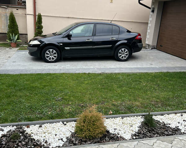 Черный Рено Меган, объемом двигателя 1.6 л и пробегом 158 тыс. км за 4250 $, фото 1 на Automoto.ua