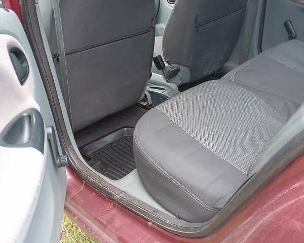 Красный Рено Меган, объемом двигателя 1.6 л и пробегом 147 тыс. км за 2100 $, фото 1 на Automoto.ua