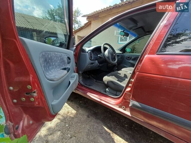 Червоний Рено Меган, об'ємом двигуна 1.39 л та пробігом 316 тис. км за 1500 $, фото 1 на Automoto.ua