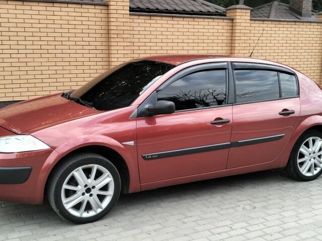 Рено Меган 2005 в Красилове на Automoto.ua Красный Рено Меган, объемом двигателя 1.4 л и пробегом 166 тыс. км за 3300 $, фото 1 на Automoto.ua
