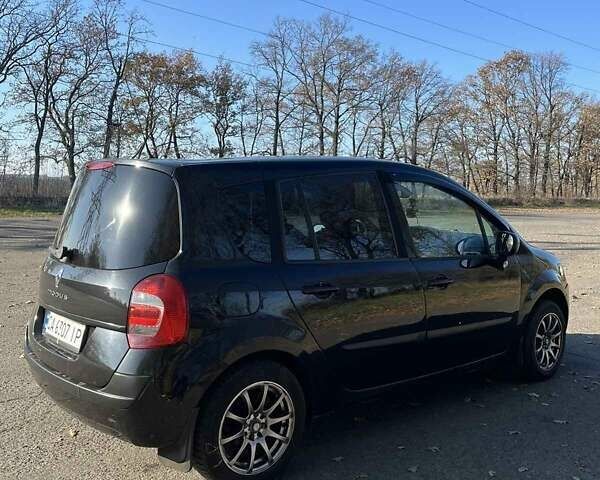 Черный Рено Модус, объемом двигателя 1.5 л и пробегом 290 тыс. км за 5300 $, фото 1 на Automoto.ua