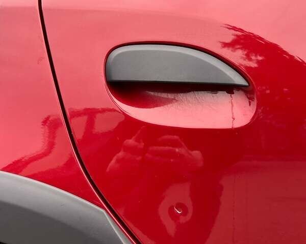 Красный Рено Сандеро СтэпВэй, объемом двигателя 0.9 л и пробегом 90 тыс. км за 10300 $, фото 1 на Automoto.ua